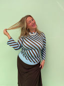 Lila bluse i striber